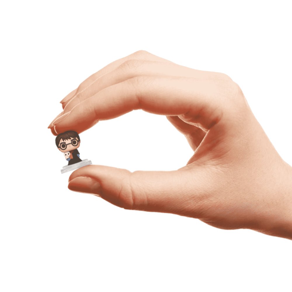 Bitty Pop! Movies: Harry Potter - Harry in Robe w/ Scarf 4pk - دمية – Store974 Electronics WLL | ستور٩٧٤ للالكترونيات ذ.م.م